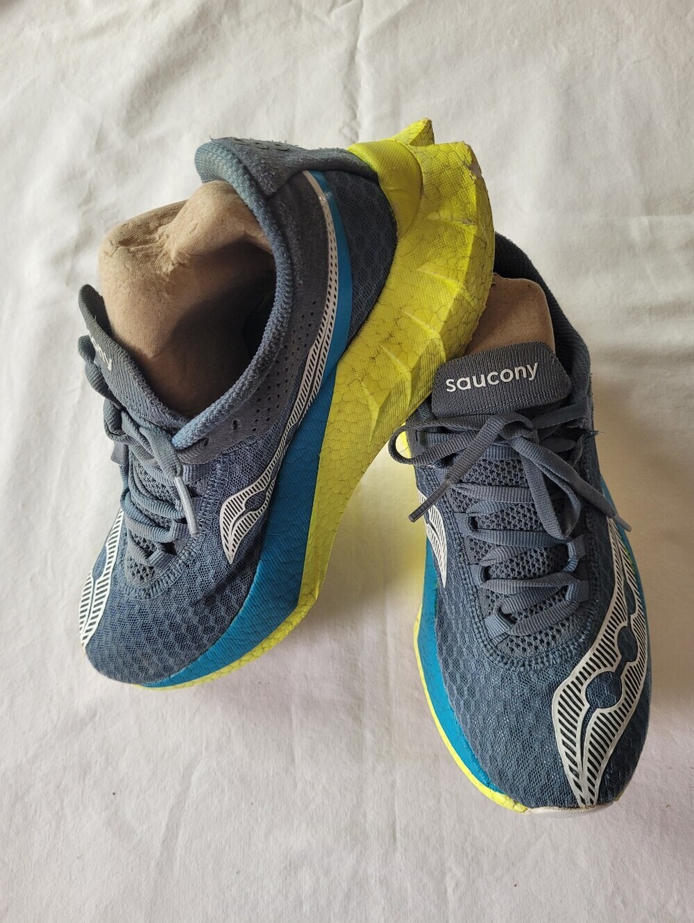 Saucony running shoes in blue and neon yellow Size 7.5